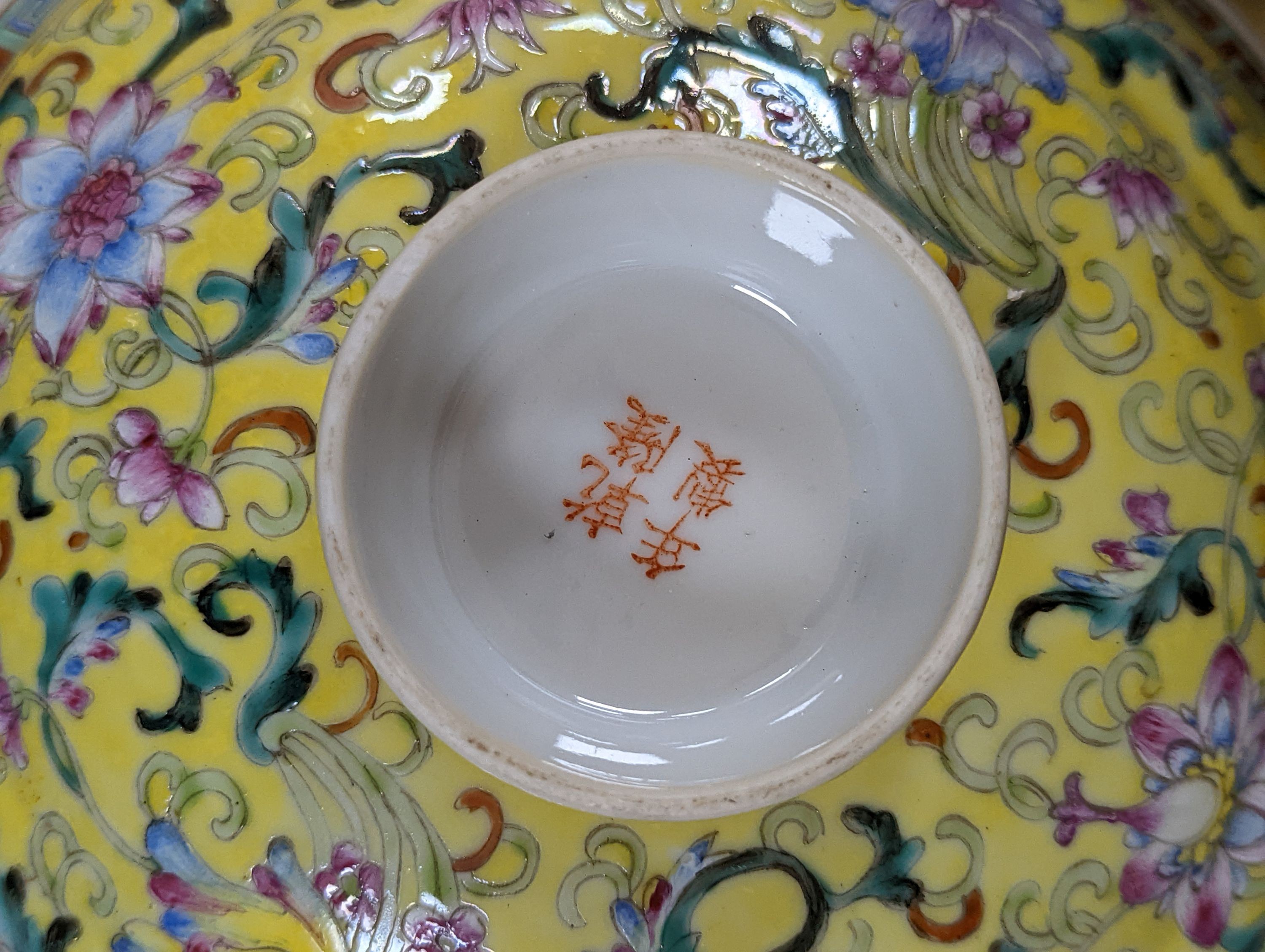 A group of Chinese enamelled porcelain plates, dishes, covers, cups and a vase